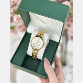 ساعة Michael Kors ذهبية بنقشة MK