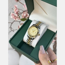 ساعة Rolex نسائية بتصميم دائري معدني